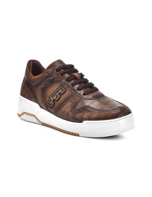 Tenis de piel para hombre
